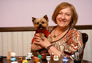 Elsinger displays a variety of objects tiny enough to receive her affection.